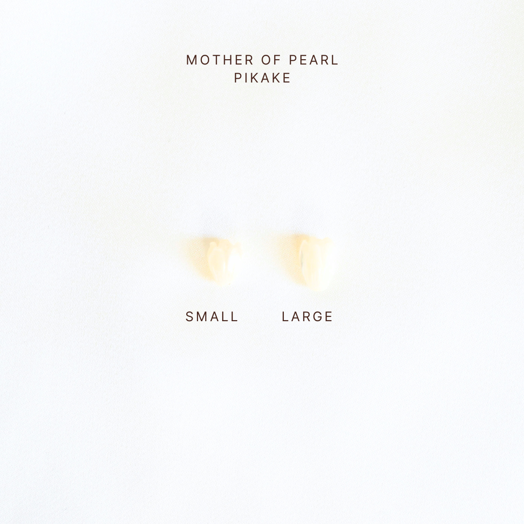 Comparison of mother of pearl pikake flower bead sizes in small and large