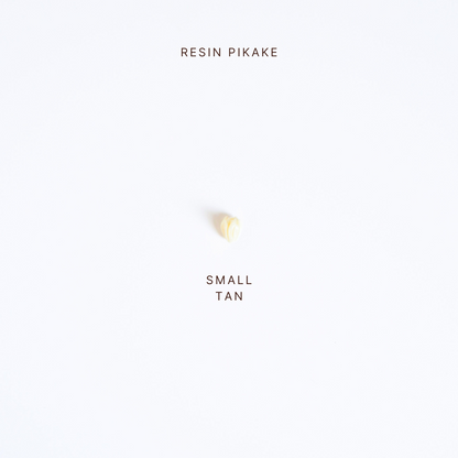 Small tan resin Pikake on a white background with 'Resin Pikake' text above.
