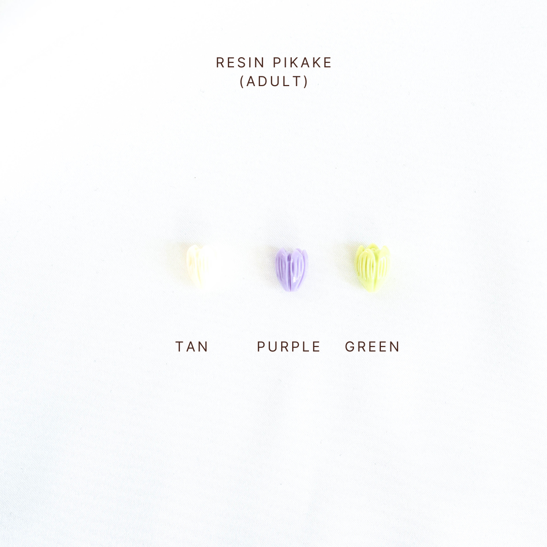 Color swatches for Resin Pikake in Tan, Purple, and Green on a white background.