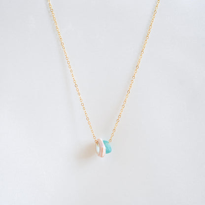 Necklace with sell and blue seaglass charms on gold chain