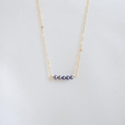 Gold necklace with five blue freshwater pearls