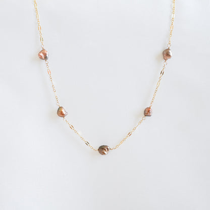Necklace with brown keshi pearls on gold chain