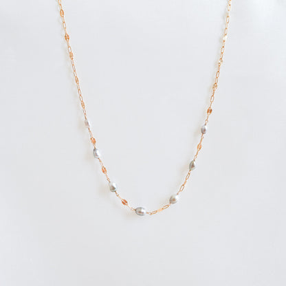 Necklace with seven small keshi pearls on gold chain